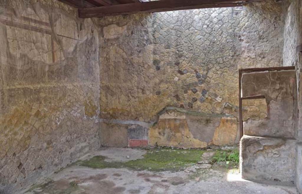 IV.14, Herculaneum, April 2018. Taberna vasaria with latrine at rear, on right. Photo courtesy of Ian Lycett-King. Use is subject to Creative Commons Attribution-NonCommercial License v.4 International.